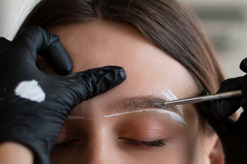 Young Teen Girl Having Her Eyebrows Trimmed and Shaped